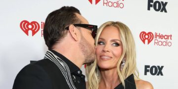 Donnie Wahlberg and Jenny McCarthy pack on the PDA as they enjoy sweet date night out
