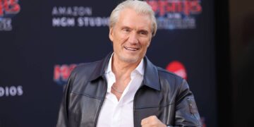 Rocky star, 68, enjoys rare red carpet outing with wife, 30, and daughter, 24